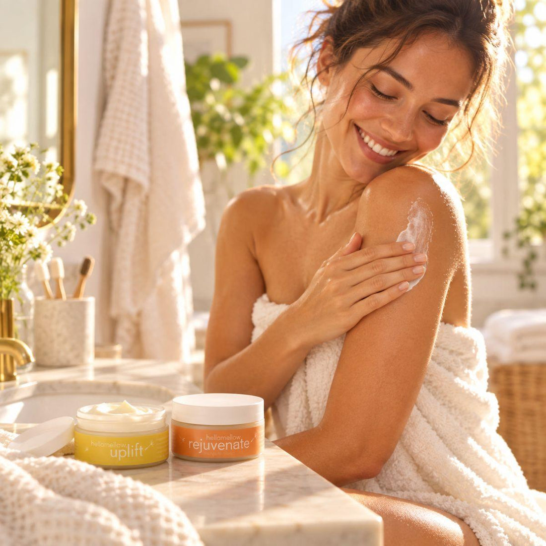 woman spreading uplift body butter on her arm in a warmly lit bathroom