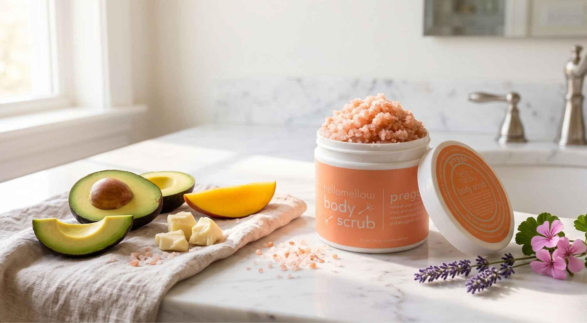open preggo body scrub surrounded by plant oils, butter ingredients, lavender and mineral crystals.