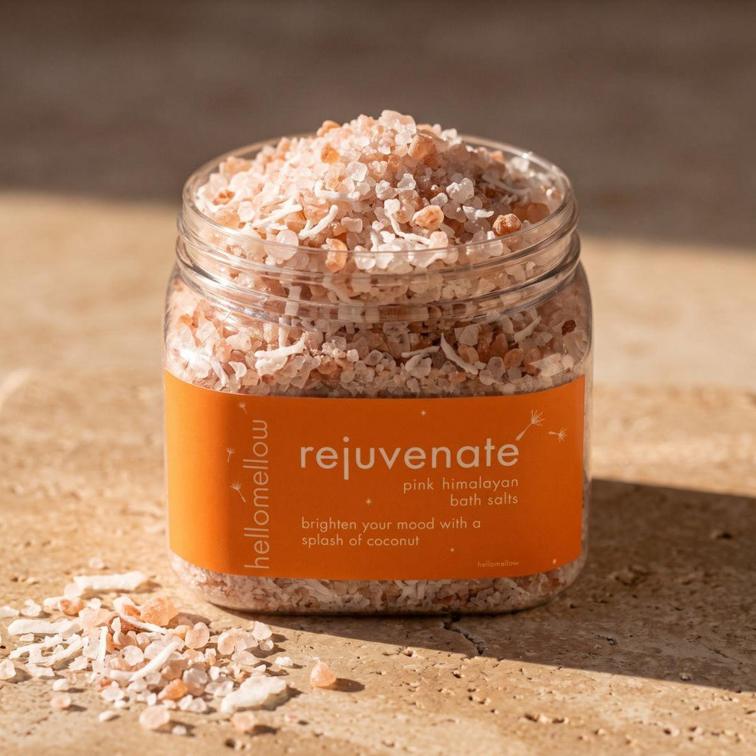open rejuvenate bath salts showing the mineral crystal texture inside