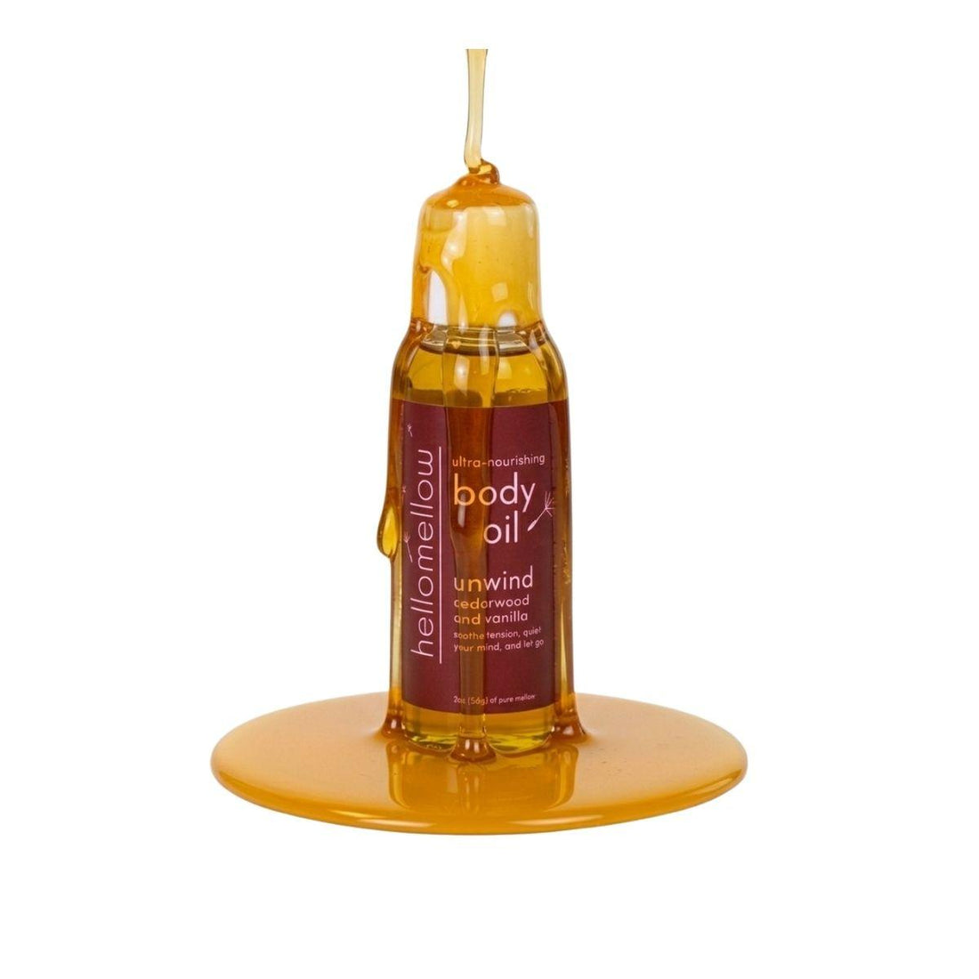 unwind mini oil with oil dripping and a white background