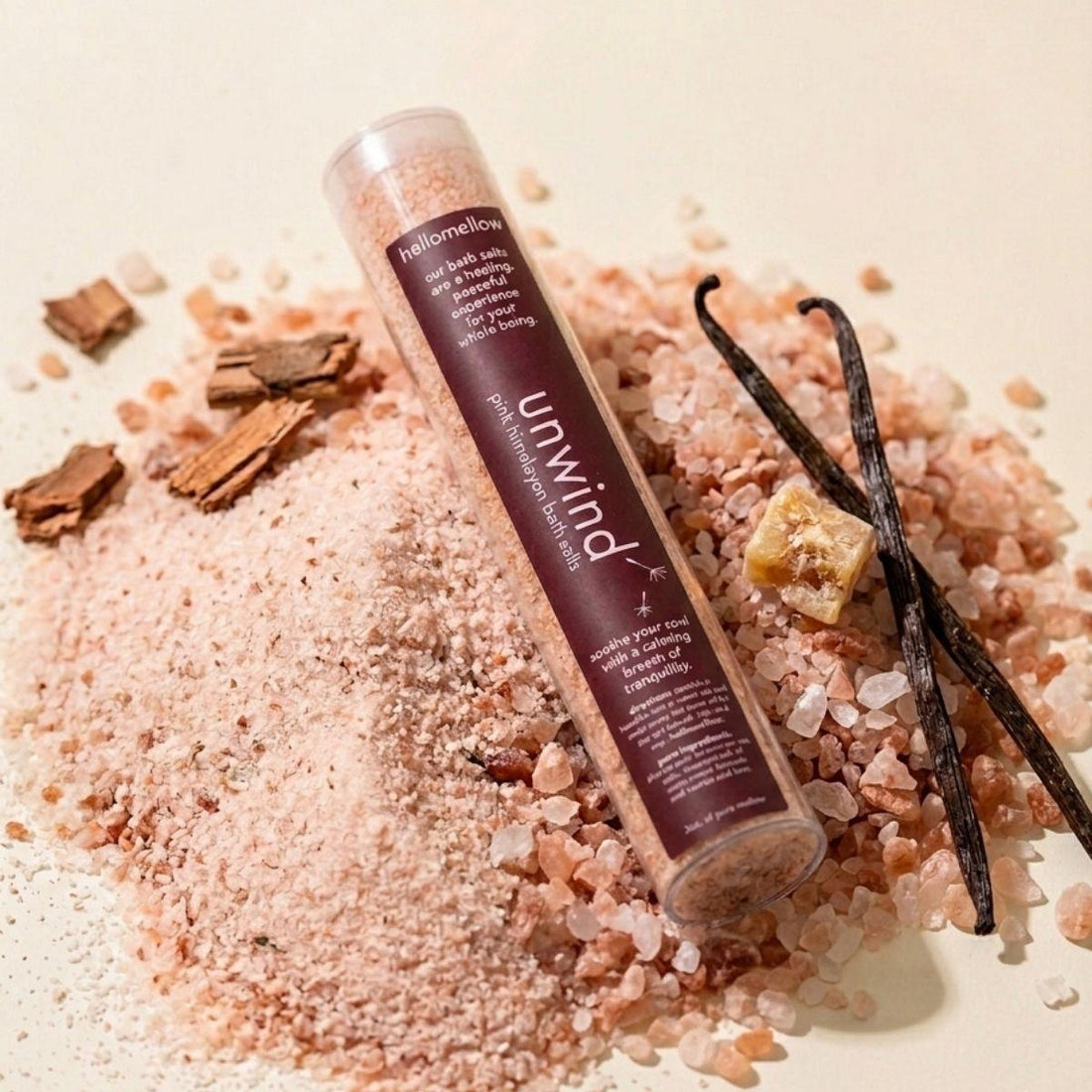 one shot bath salt in empower aroma sitting a mound of himalayan pink salt