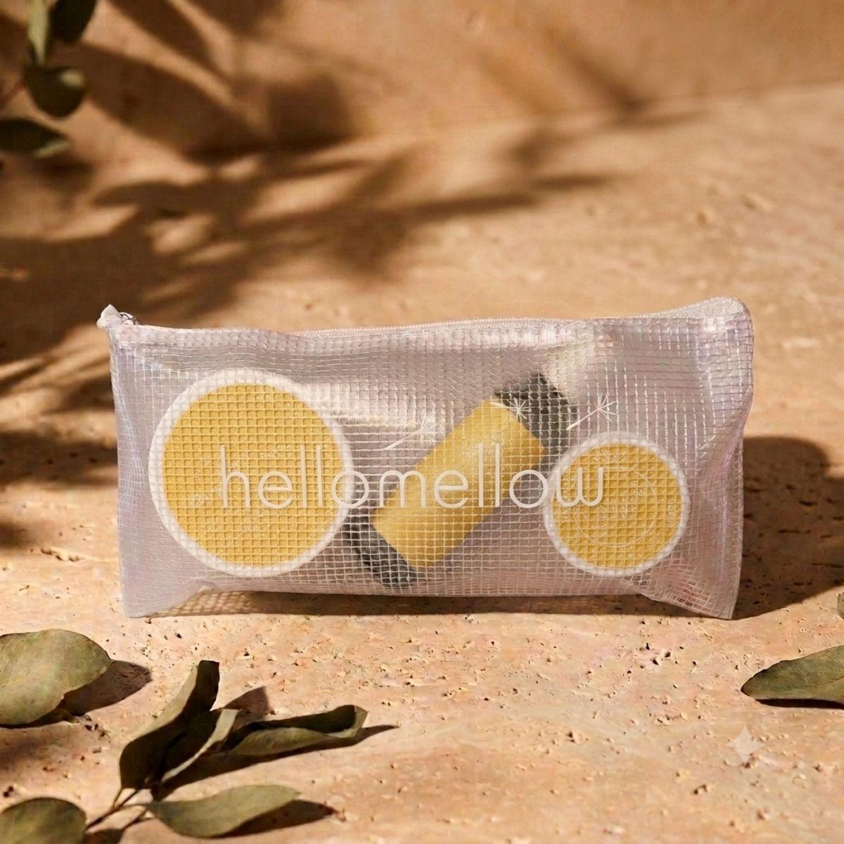 the essential routine mini uplift: mini body scrub, mini body oil and mini body butter, with the free hellomellow bag