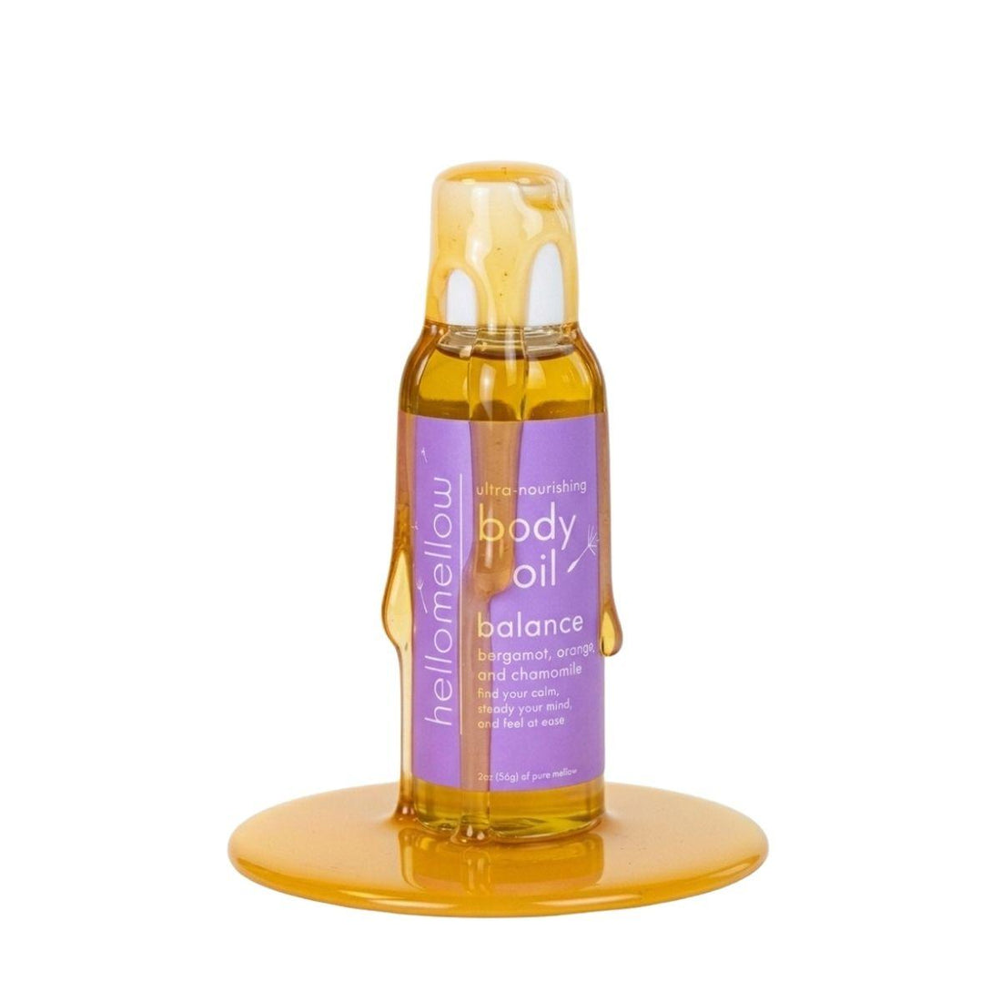 balance mini oil with oil dripping and a white background