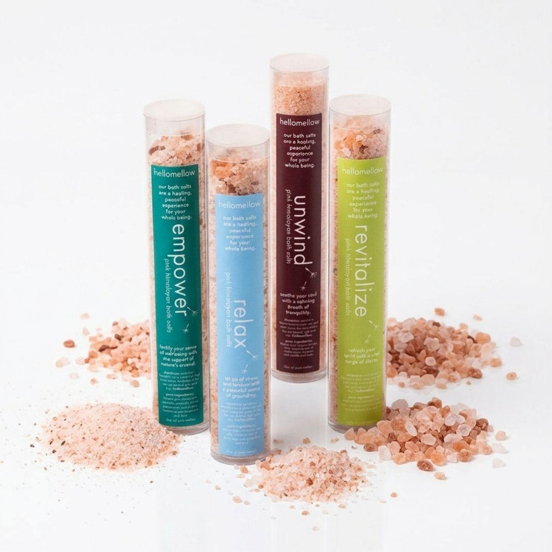 all bath salt one shots pictured together with pink himalayan sea salt sprinkled in piles 