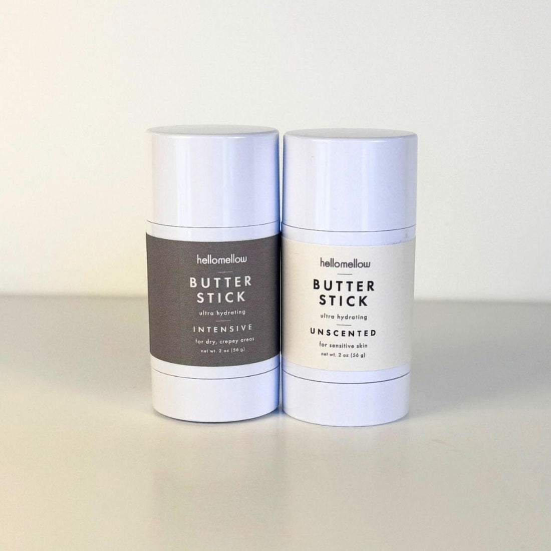 body butter stick duo photograph both the unscented and intensive together closed with the lids on