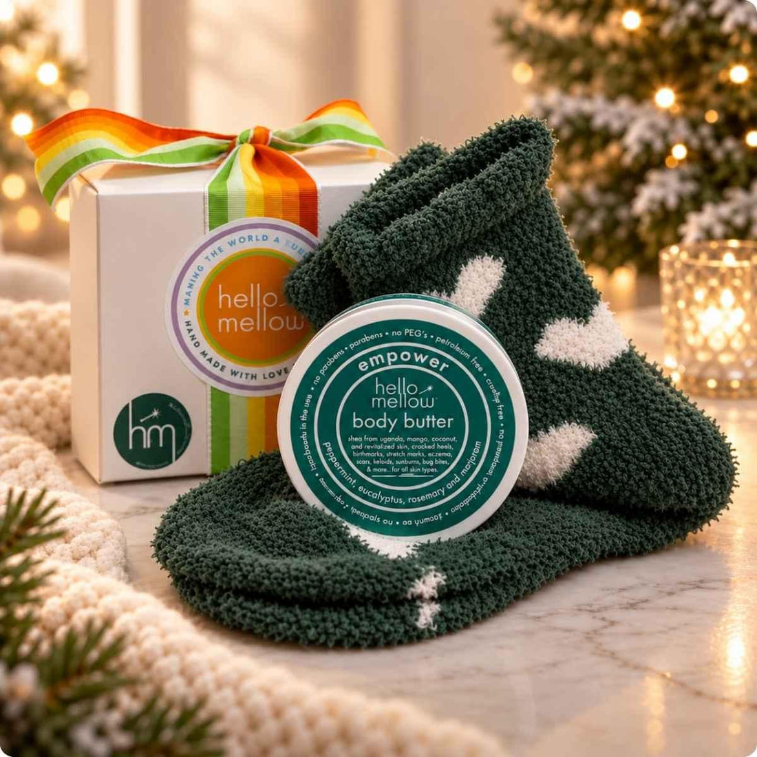 empower 2 oz body butter and cozy sock gift wrapped in holiday setting