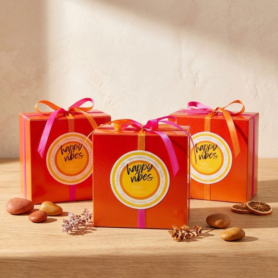 3 happy vibe boxes wrapped with a bow