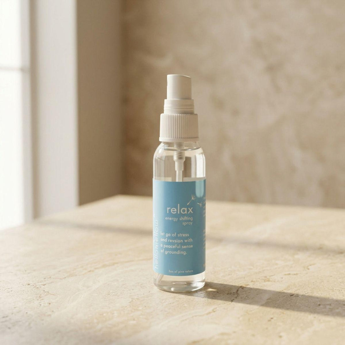 relax energy shifting spray bottle standing front-facing on a warm neutral surface