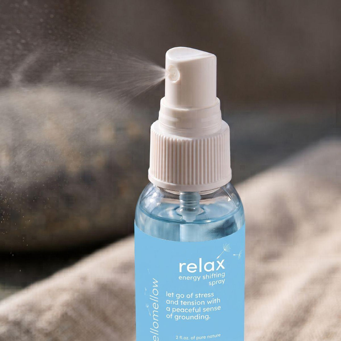 close view of the uplift energy shifting spray bottle and its real spray top