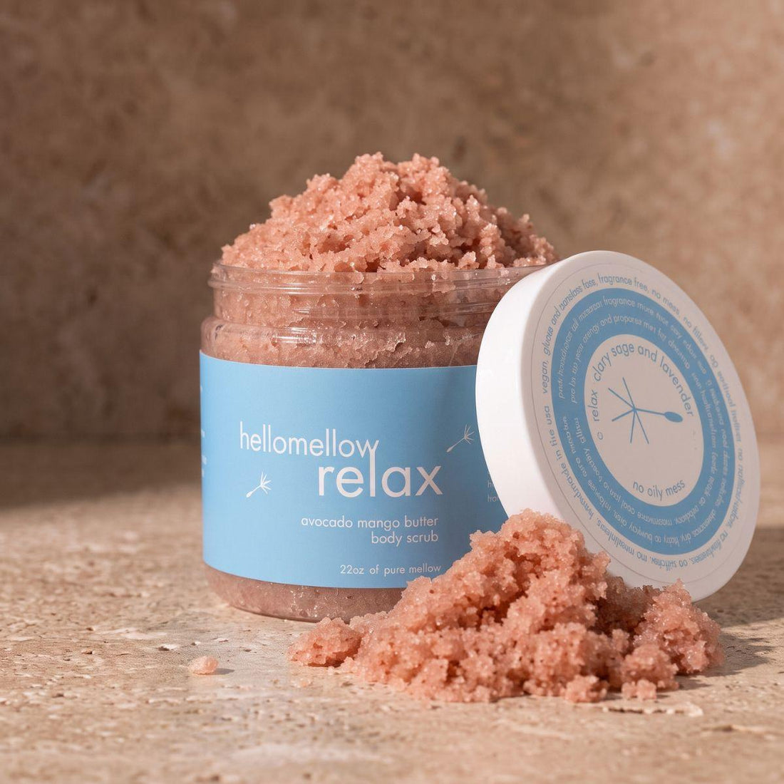 open relax body scrub showing the natural pink salt texture inside