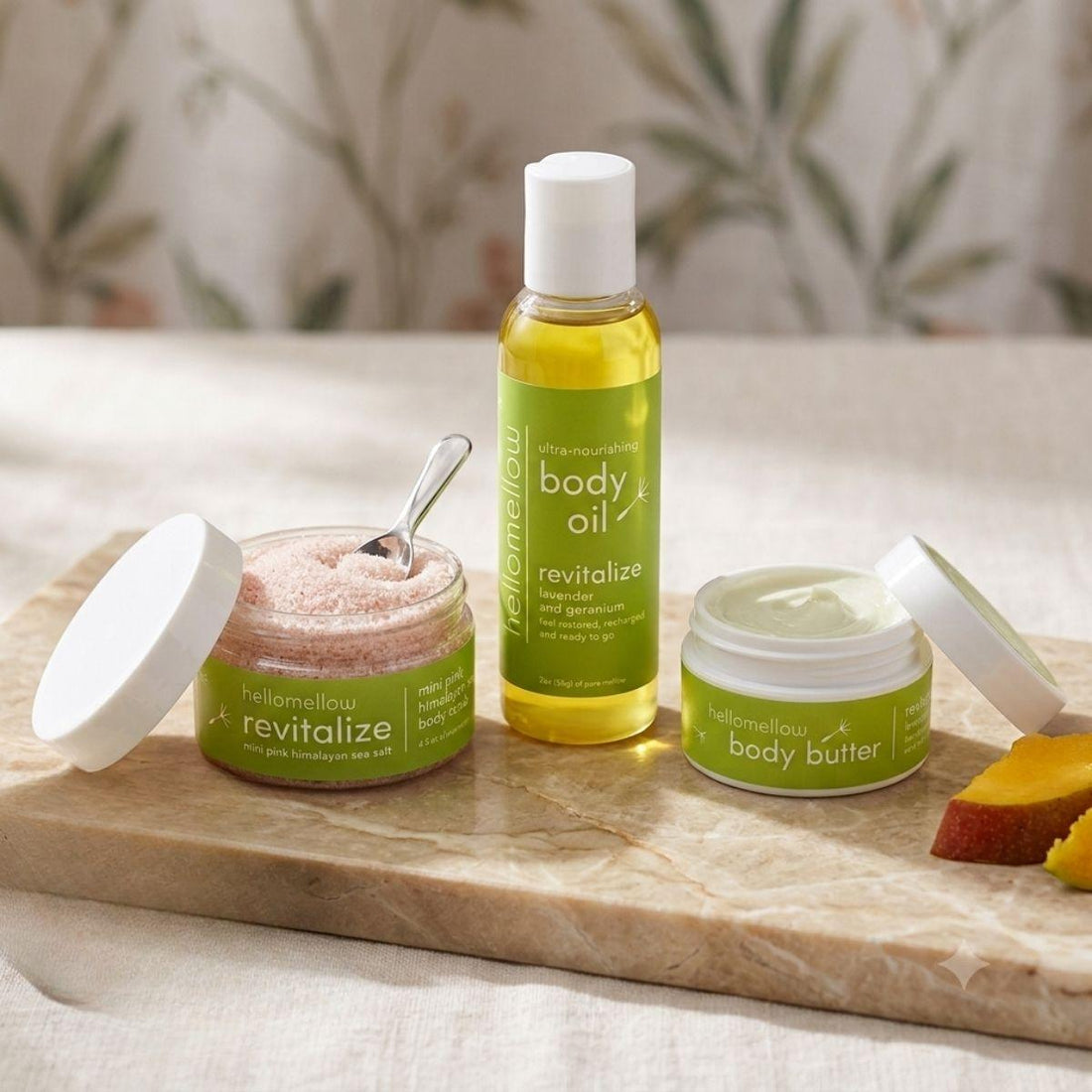 revitalize mini essential routine in a warm bathroom body butter body oil and boy scrub 
