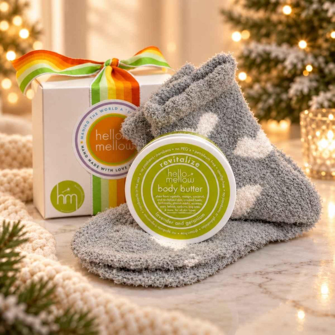 revitalize 2 oz body butter and cozy sock gift wrapped in holiday setting