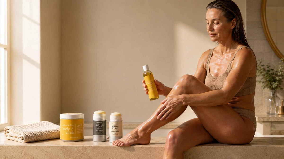 woman applying hellomellow body oil butter and scrub in uplift in a serene bathroom